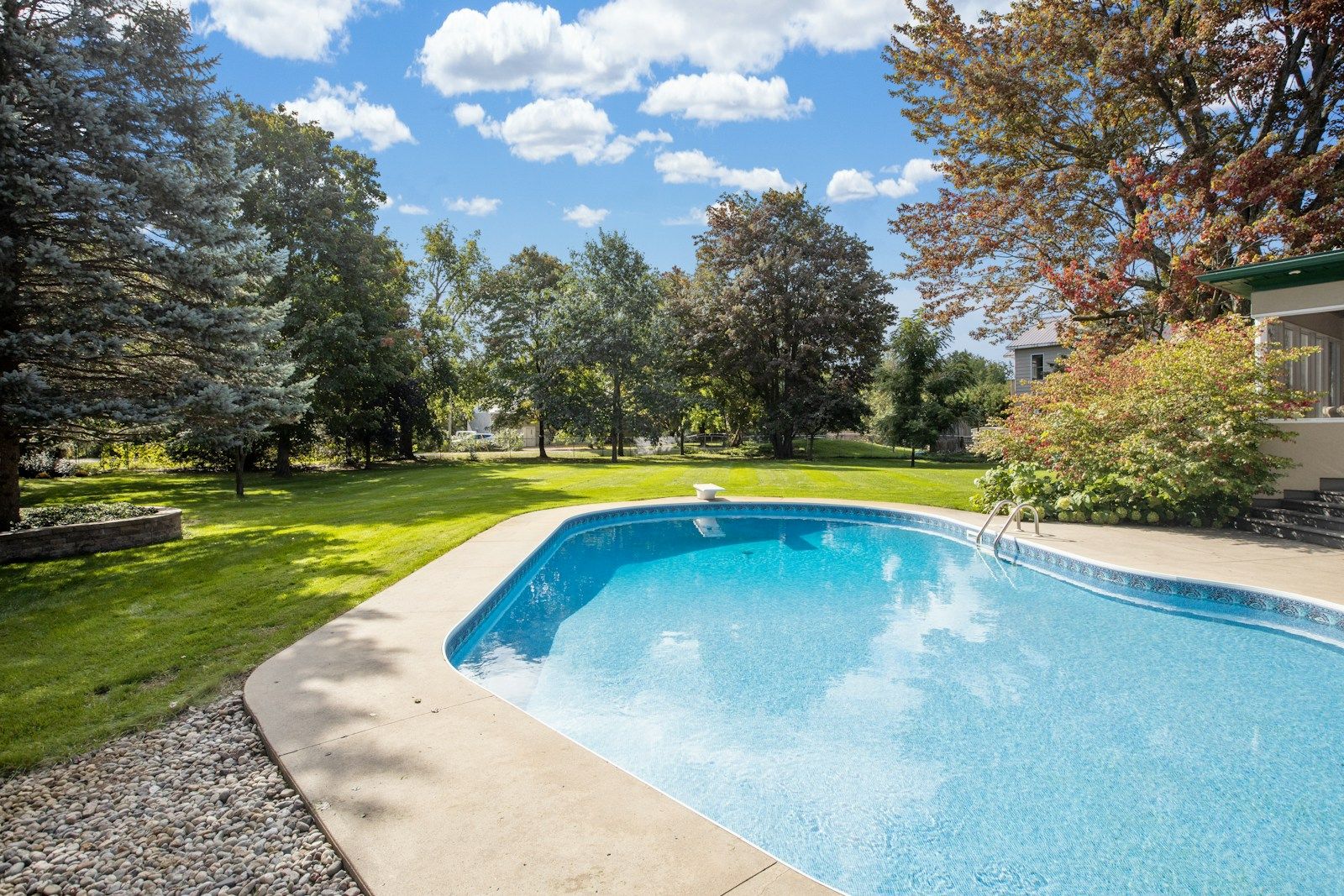 Clear blue pool in a backyard